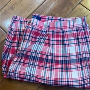 Men’s pleated red plaid polo shorts